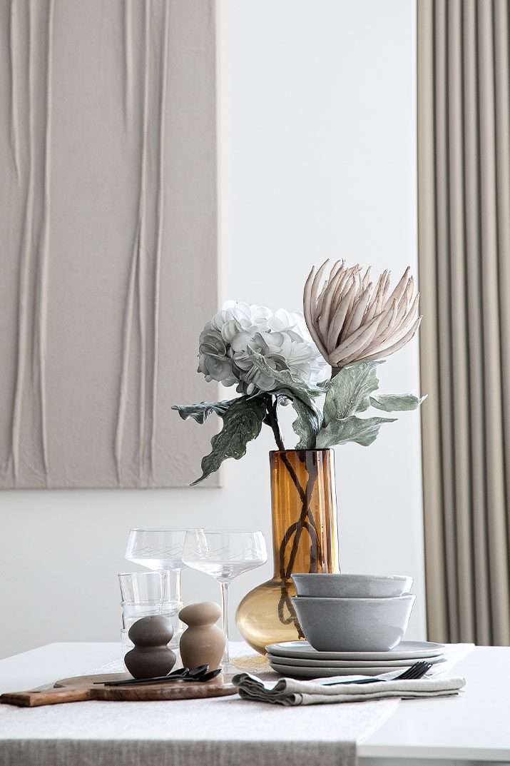 Modern bespoke table with refined detailing designed for London show home staging