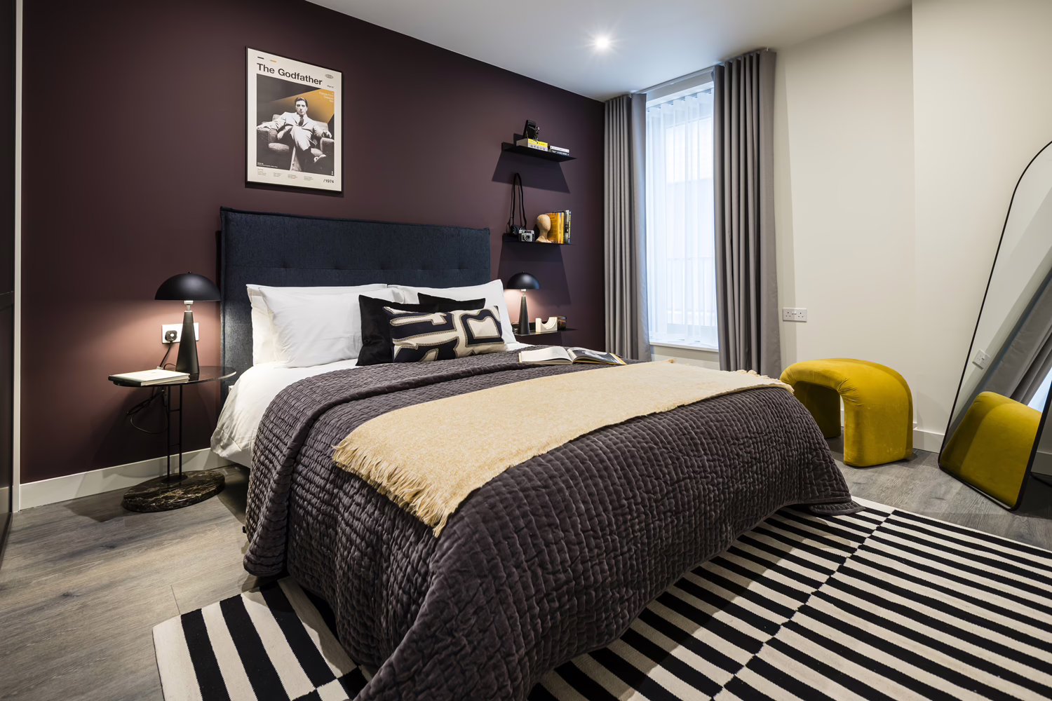 Modern Bedroom – Stylish bedroom interior design with timeless furniture and red accents for warmth and personality. Aesop toiletries and towels by The White Company.